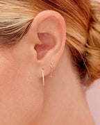 Woman wearing White Sapphire Chain Huggie || option::14K Solid Gold || set:white-sapphire-chain-huggies-stl