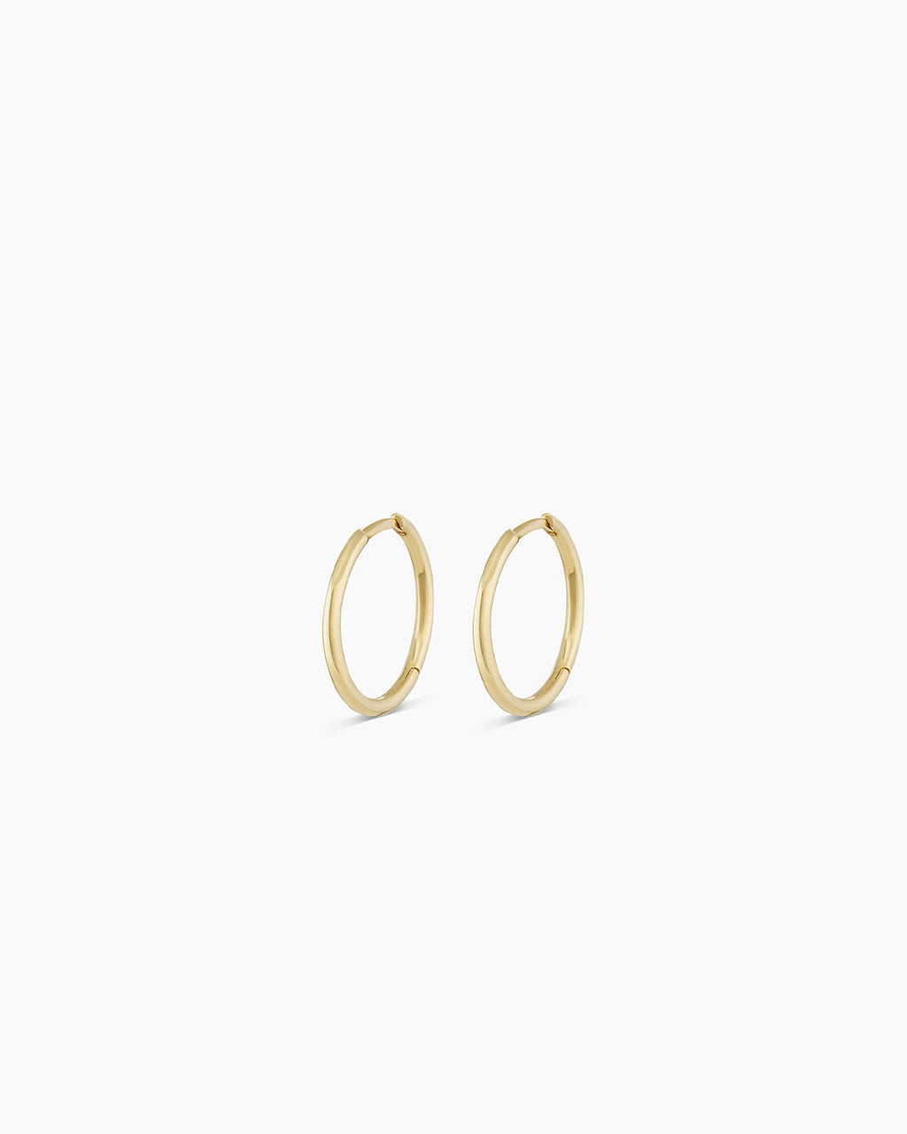 Woman wearing Classic Gold Huggie || option::14K Solid Gold, 11mm
