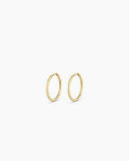 Woman wearing Classic Gold Huggie || option::14K Solid Gold, 11mm