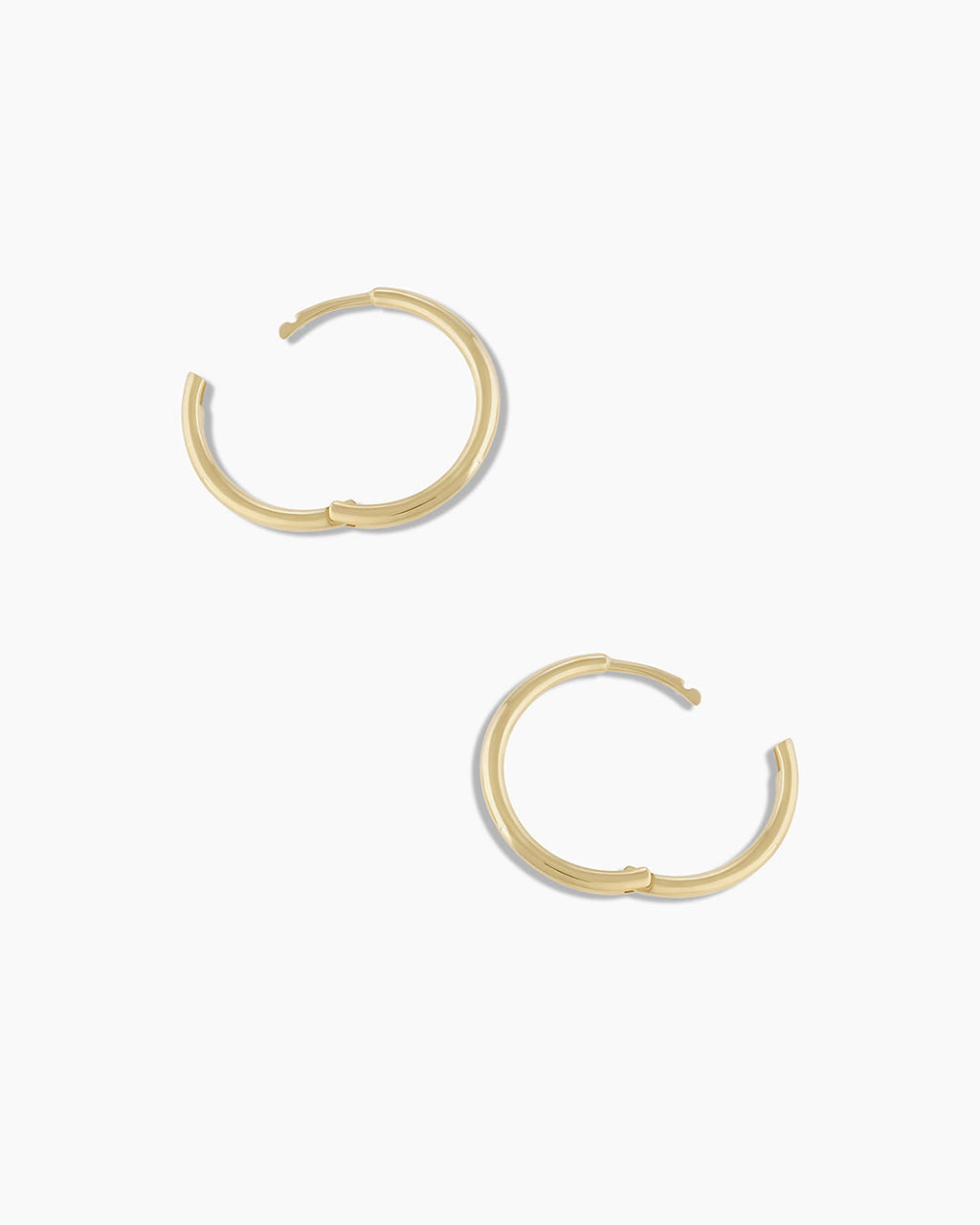 Woman wearing Classic Gold Huggie || option::14K Solid Gold, 11mm