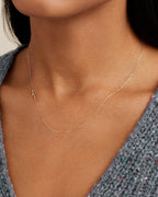 Woman wearing Alphabet Necklace || option::14K Solid Gold, A