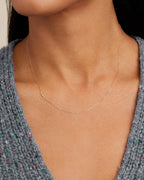 Woman wearing Alphabet Necklace || option::14K Solid Gold, E
