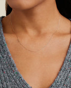 Woman wearing Alphabet Necklace || option::14K Solid Gold, U