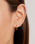 Woman wearing Classic Gold Huggie || option::14K Solid Gold, 15mm