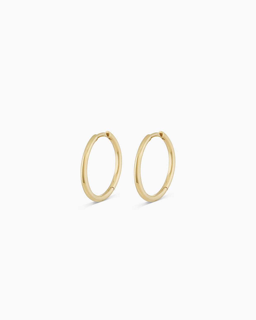 Woman wearing Classic Gold Huggie || option::14K Solid Gold, 15mm