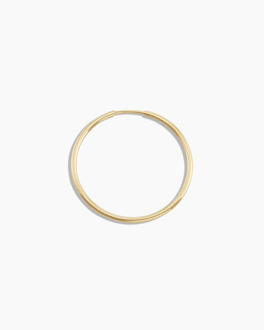 Woman wearing Classic Gold Hoop || option::14K Solid Gold, 22mm