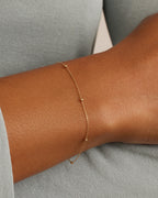 Woman wearing Newport Bracelet || option::14K Solid Gold