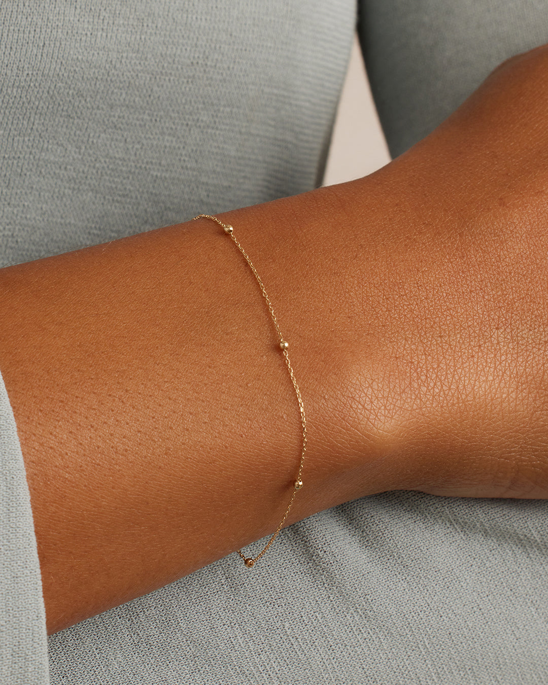 Woman wearing Newport Bracelet || option::14K Solid Gold
