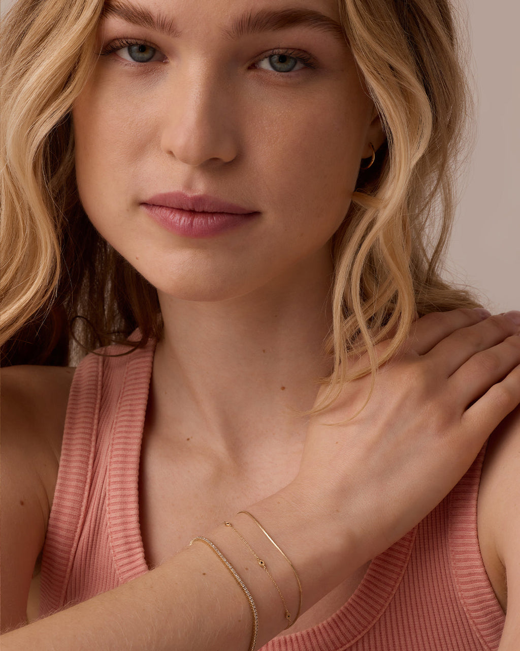 Woman wearing Micro Mini Venice Bracelet || option::14K Solid Gold, 6.5 in.