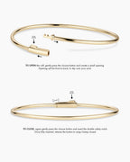 Instructions to wear the cuff: TO OPEN the cuff, gently press the closure button and create a small opening. Opening will be front to back, to slip over your wrist. TO CLOSE, again gently press the closure button and insert the double safety notch. Once fully inserted, release the button to snap/clamp closed. 