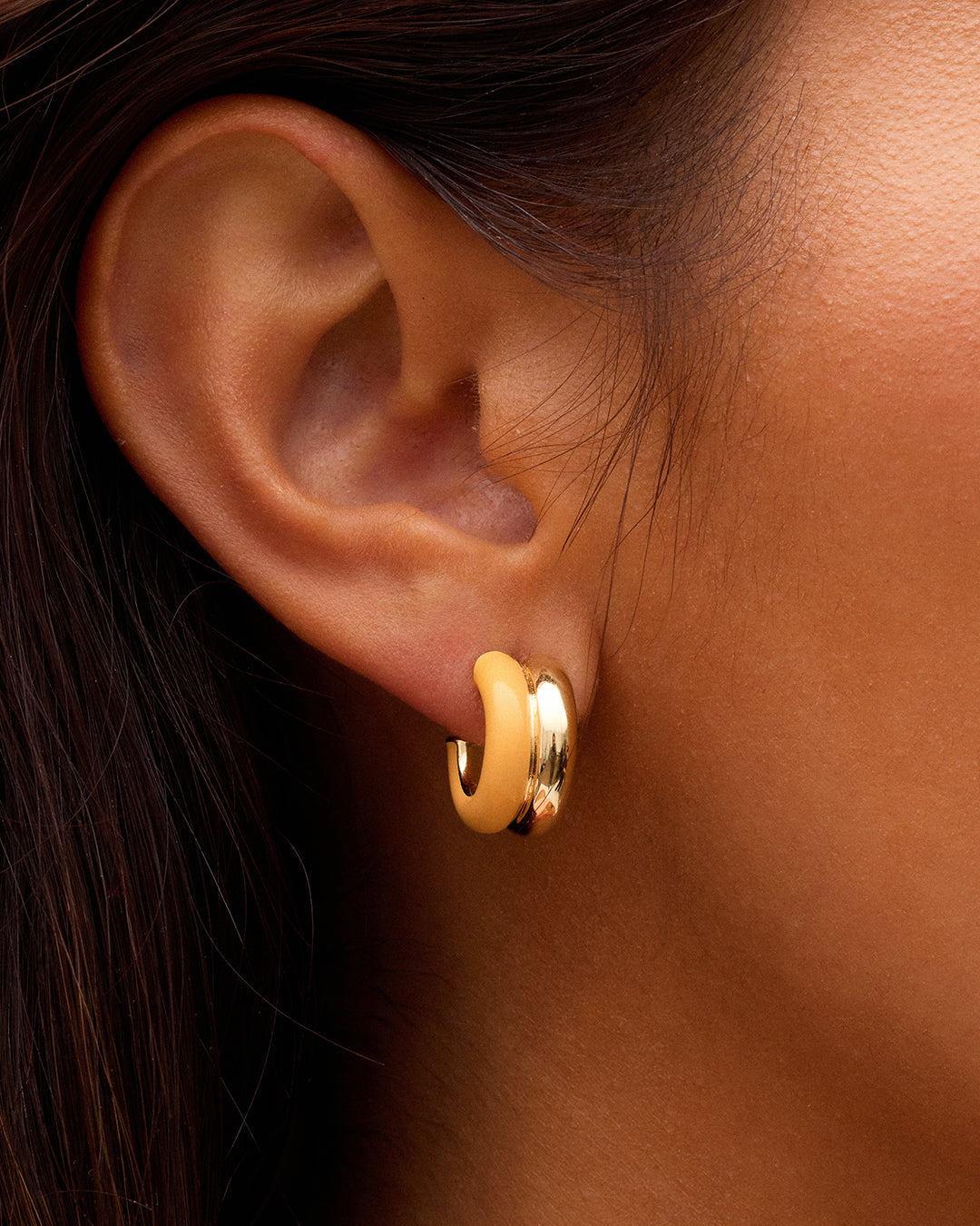 On model Lou Stacked Huggies || option::18K Gold Plated, Yellow