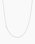 Woman wearing Alphabet Necklace || option::14K Solid White Gold, L