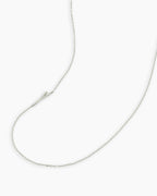 Woman wearing Alphabet Necklace || option::14K Solid White Gold, Y